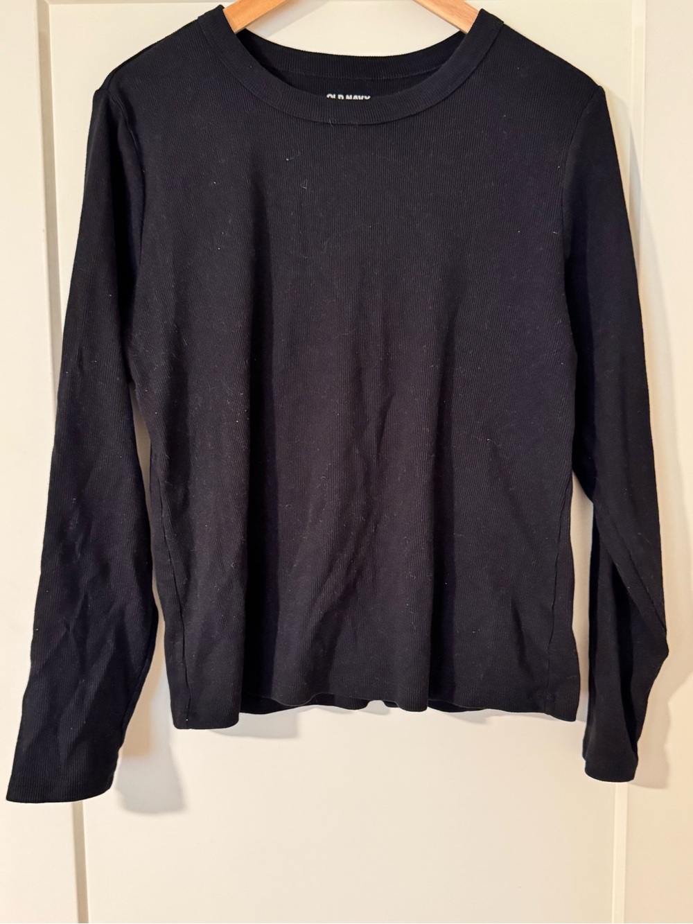 Old Navy Black Ribbed Crewneck Sweater Needs lint rolled.. didn’t have one..